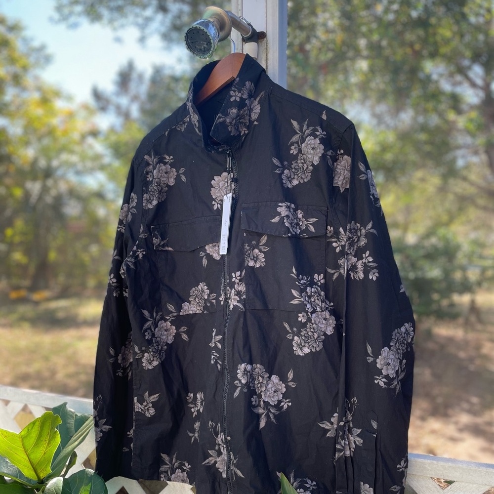 Denim & Flower
Large zip-up long sleeved shirt.